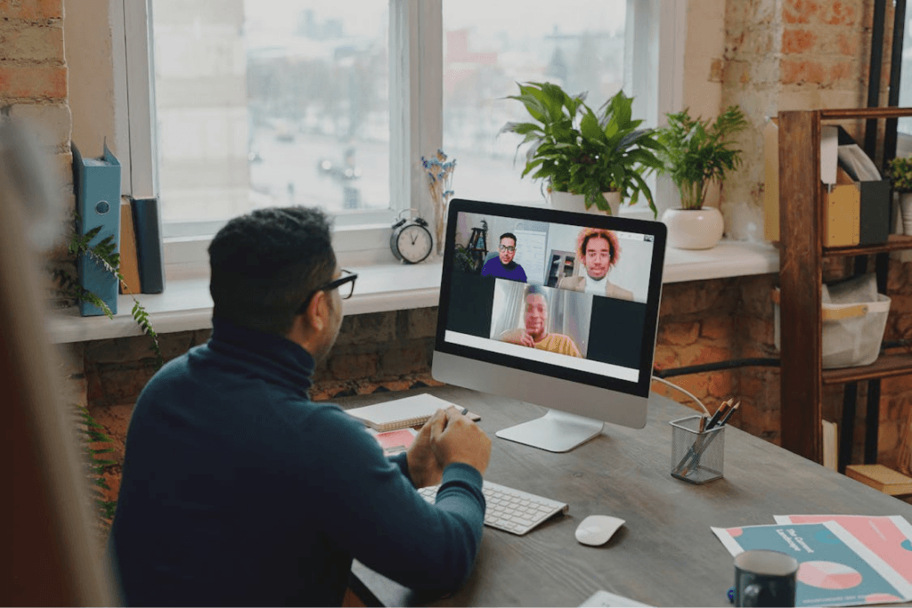Counselor in a video supervision call from a home office